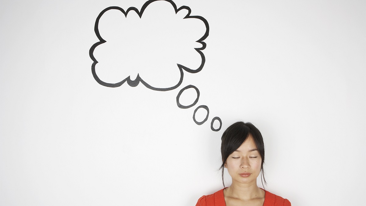 Woman with eyes closed and thinking bubble over her head